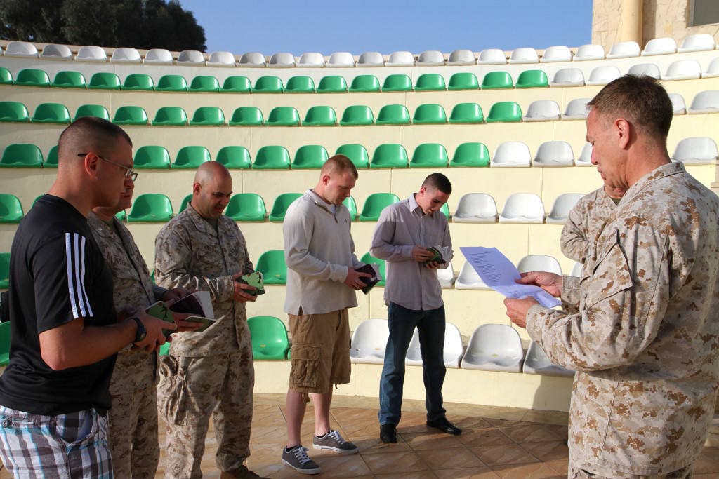 Chaplain Commander Dale Marta of the 14th Marine Regiment, HQ Battery leads a memorial service, in Agadir, Morocco, in honor of those that lost their lives on April 18 at the West Fertilizer Plant. A similar ceremony was held two days prior in honor of the victims of the Boston Marathon bombing.