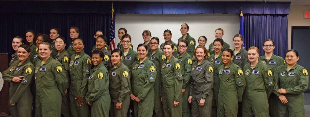 An all-female alert missile crew from Malmstrom Air Force Base, Mont., poses for a photograph March 22, 2016, after a pre-departure briefing at the base. (U.S. Air Force photo by Airman Collin Schmidt)