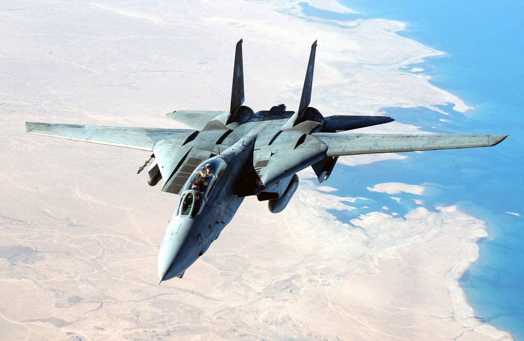 A U.S. Navy F-14D Tomcat aircraft flies a combat mission in support of Operation Iraqi Freedom.