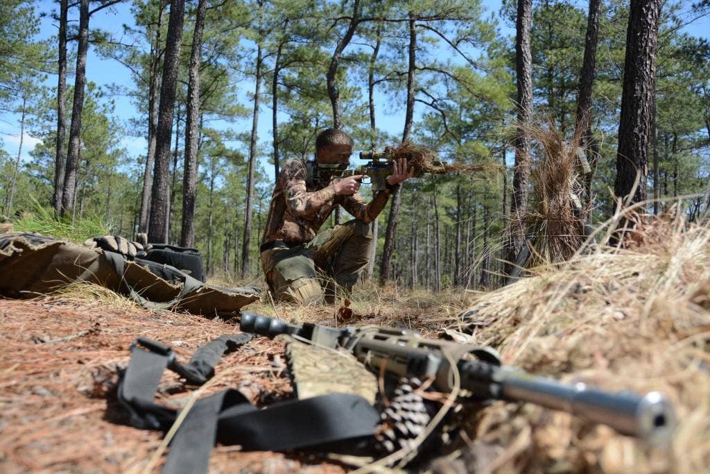 A sniper with the Army Marksmanship Unit prepares for the stalk event during the 2014 competition. Photo: US Army Staff Sgt. Shelman Spencer