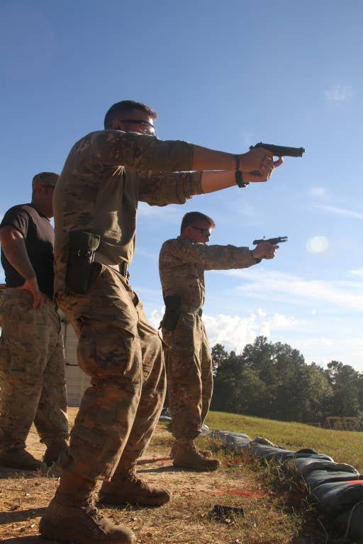 US Army snipers compete in a pistol event. Photo: US Army Sgt. Joshua Laidacker