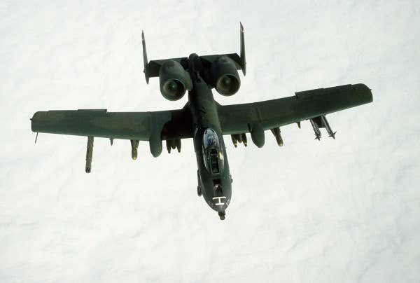 An A-10A Thunderbolt II aircraft takes part in a mission during Operation Desert Storm. The aircraft is armed with AIM-9 Sidewinder missiles, AGM-65 Maverick missiles, and Mark 82 500-pound bombs. (Air Force Photo)