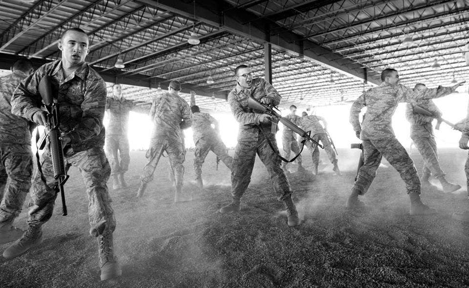Trainees practice proper security procedures before being sent out to their field training exercise. The week-long event exposes the trainees to conditions similar to what they'd see in a deployed environment and also gives the trainees an opportunity to work together as a team without the guidance of their instructors. (U.S. Air Force Photo by Staff Sgt. Christopher Griffin)