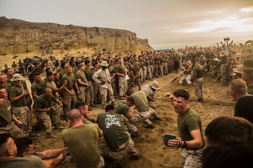 U.S. Marines with 1st Light Armored Reconnaissance Battalion, 1st Marine Division participate in a tug of war competition during warrior night at Marine Corps Base Camp Pendleton, Calif., July 1, 2015. Warrior night is an annual event held to build camaraderie in the battalion. (U.S. Marine Corps photo by Lance Cpl. Ryan P. Kierkegaard)