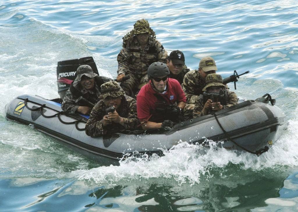 Philippine Naval Special Warfare Group members in 2009. The camouflaged commando at center left is carrying an M3. | U.S. Navy photo