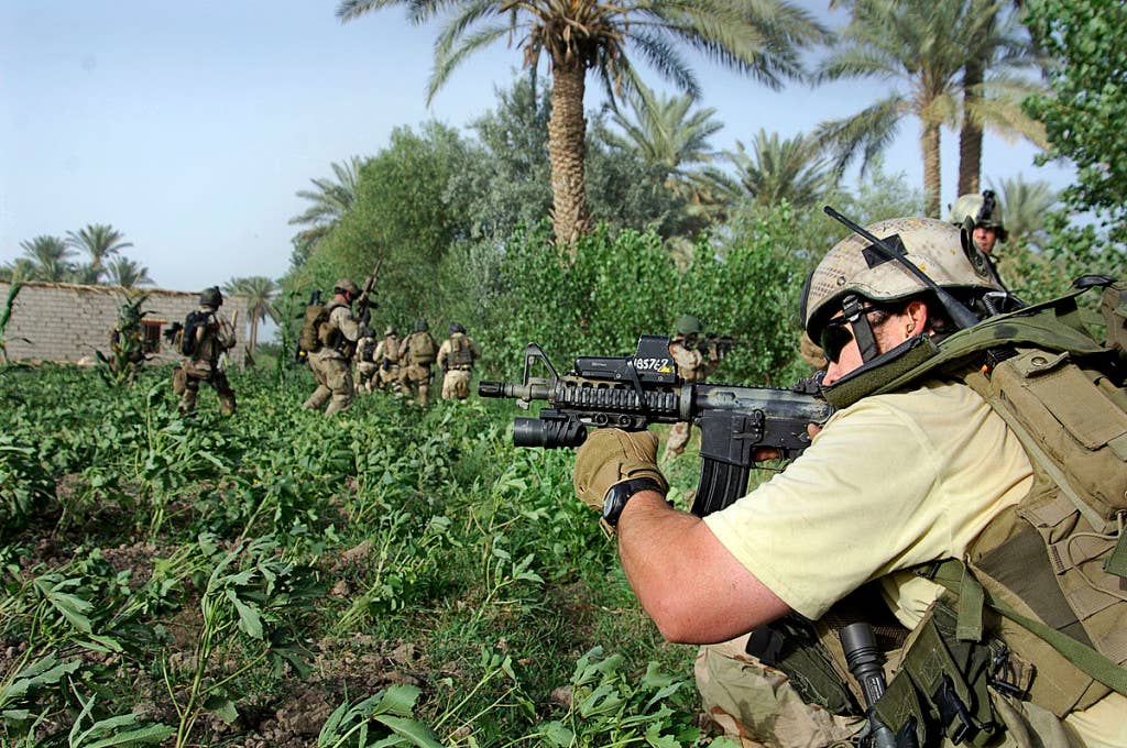 Navy SEALs fight against insurgents in Iraq in this 2007 photo. Photo: Mass Communication Specialist 2nd Class Johansen Laurel