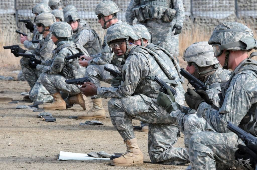 Soldiers train with M-9s. U.S. Army photo
