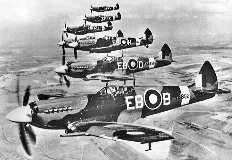 Royal Air Force Spitfires, like the plane Douglas Bader piloted, fly in formation. Photo: Public Domain