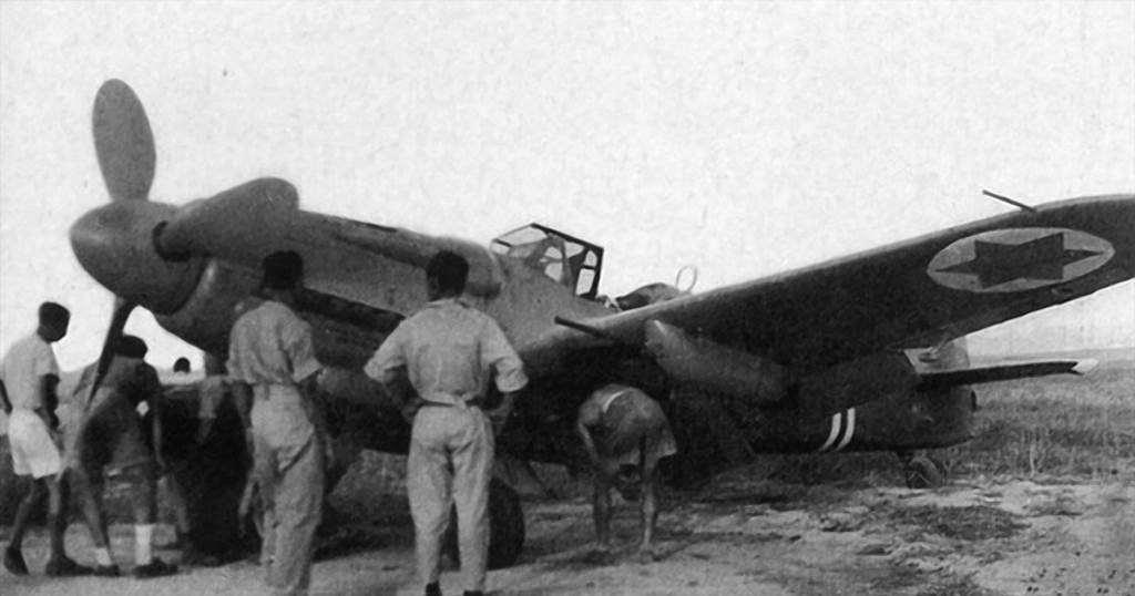 Avia S-99 being fitted for combat in 1948.