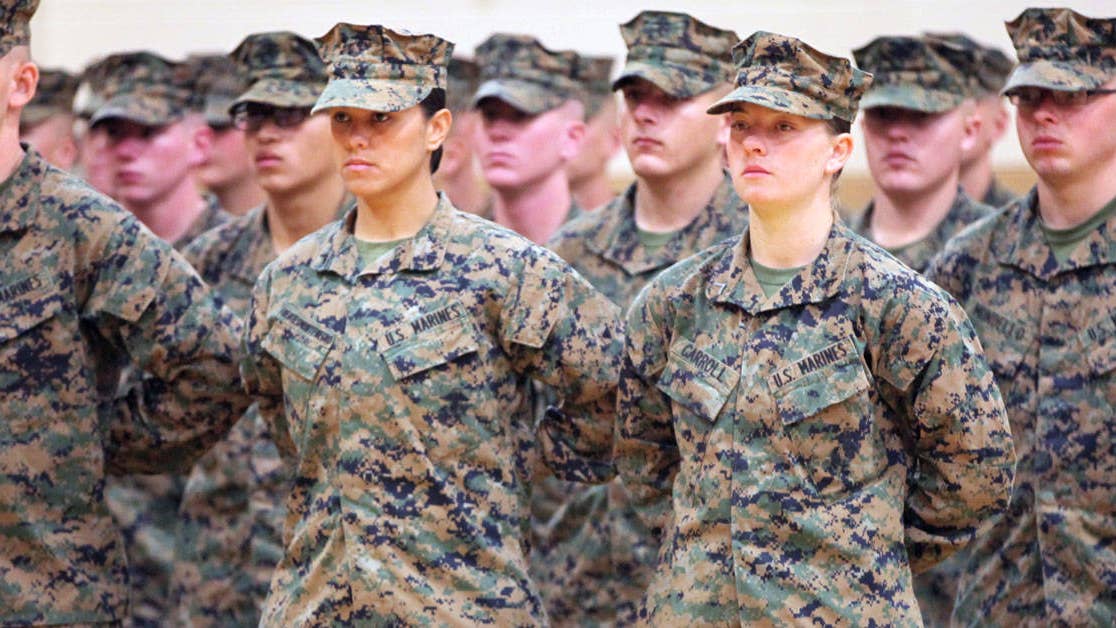 Congress removes provision that would require women to register for the draft