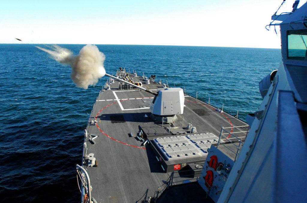 Guided-missile destroyer USS Forest Sherman (DDG 98) test fires its five-inch gun on the bow of the ship during training. | U.S. Navy photo by Mass Communication Specialist Seaman Apprentice Joshua Adam Nuzzo