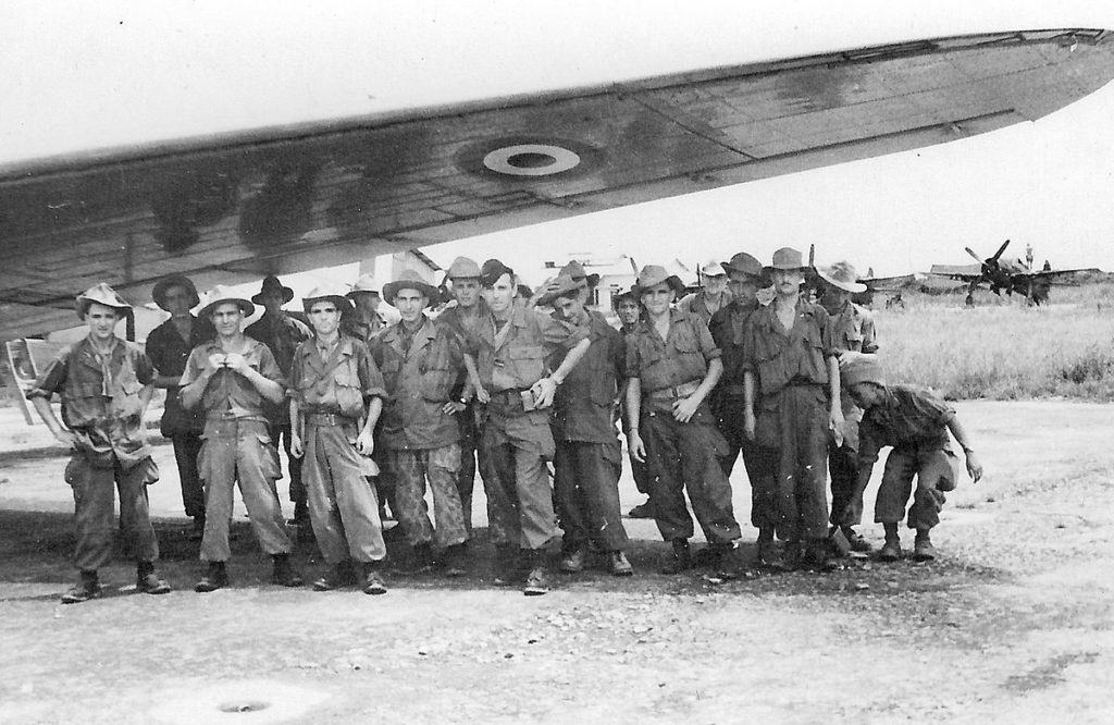 French Foreign Legionnaires assigned to Indochina pose under a plane wing. Photo: Public Domain