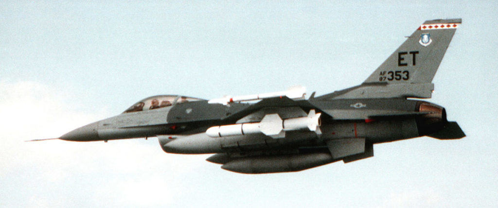 May 1992 air-to-air view of an F-16 Fighting Falcon equipped with an AGM-84 Harpoon all-weather anti-ship missile over Eglin Air Force Base. USAF photo by Cindy Farmer.