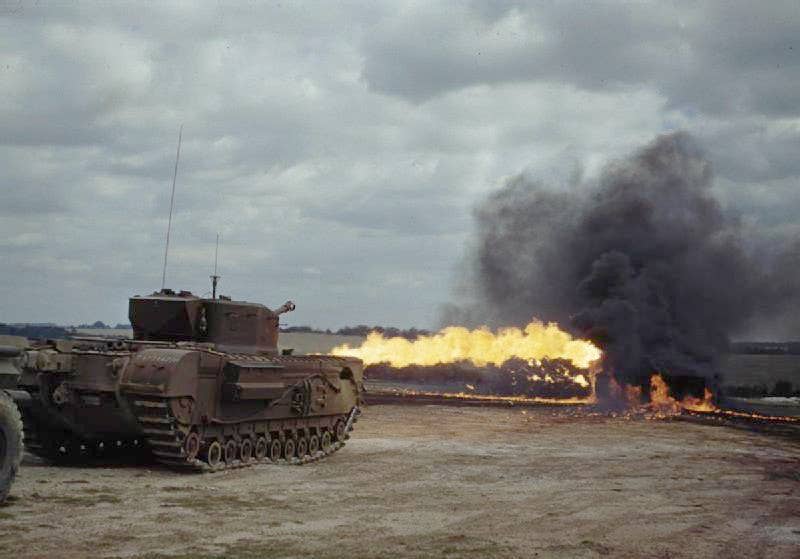 A Churchill Crocodile fires its flame thrower in August 1944.