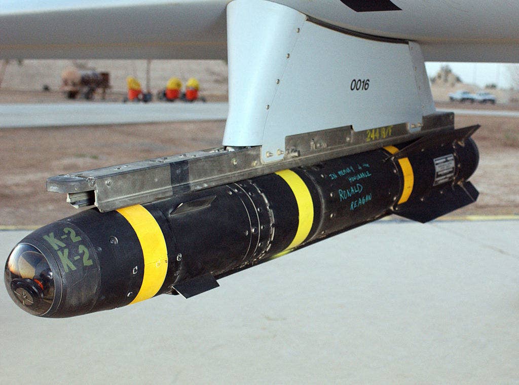 An AGM-114 Hellfire missile hung on the rail of a US Air Force (USAF) MQ-1L Predator Unmanned Aerial Vehicle (UAV).