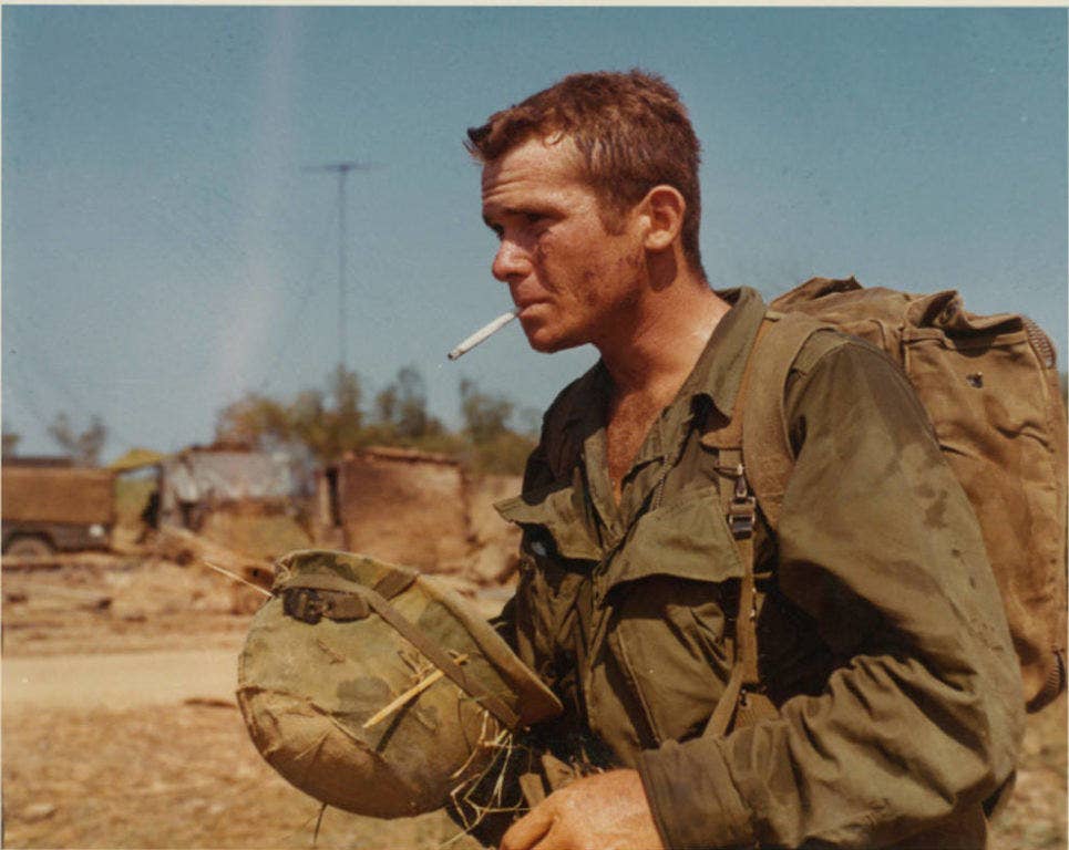 A U.S. Army soldier smokes after an all-night ambush patrol in Vietnam. Photo: Sgt. 1st Class Peter P. Ruplenas