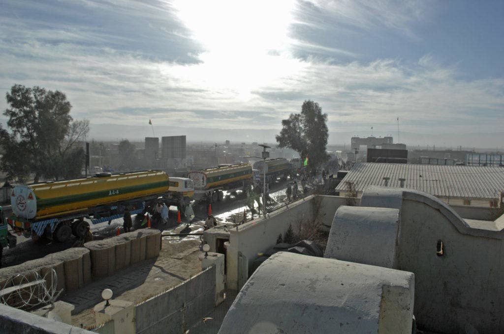 Afghan truckers make their way towards Friendship Gate, the border crossing in Wesh, Afghanistan, on their way to Pakistan. (U.S. Air Force photo by Master Sgt. Juan Valdes)