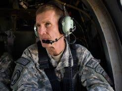Retired Gen. Stanley McChrystal sits aboard a helicopter during active duty in 2009.