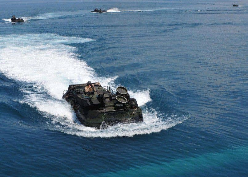 U.S. Marine Corps amphibious assault vehicles head back to their landing ship during a bilateral training mission in the South China Sea. (Photo: US Navy Mass Communication Specialist 2nd Class Katerine Noll)