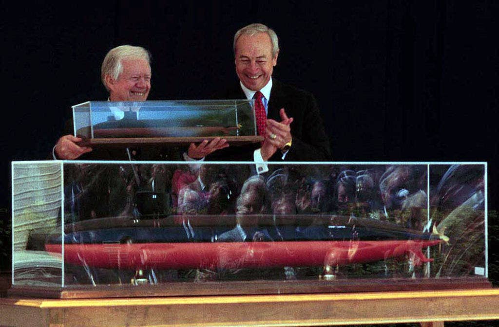 Former President Jimmy Carter receives a model of the USS Jimmy Carter, a nuclear submarine named after him. (Photo: US Marine Corps Staff Sgt. Keith A. Stevenson)