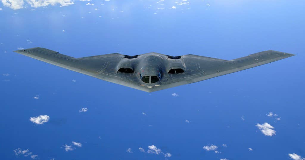 A B-2 Spirit soars after a refueling mission over the Pacific Ocean on Tuesday, May 30, 2006. The B-2, from the 509th Bomb Wing at Whiteman Air Force Base, Mo., is part of a continuous bomber presence in the Asia-Pacific region. (U.S. Air Force photo/Staff Sgt. Bennie J. Davis III)