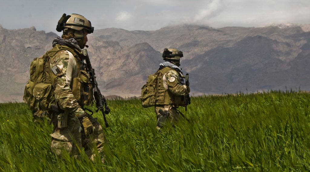 U.S. Army Special Forces soldiers from the 3rd Special Forces Group patrol a field in the Gulistan district of Farah, Afghanistan. | US Army photo by Spc. Joseph A. Wilson