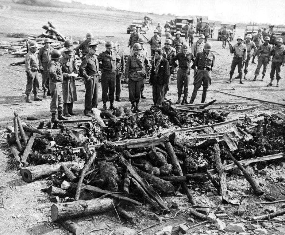 Eisenhower, Bradley and Patton inspect a cremation pyre at the Ohrdruf concentration camp on April 12, 1945. (Army photo)