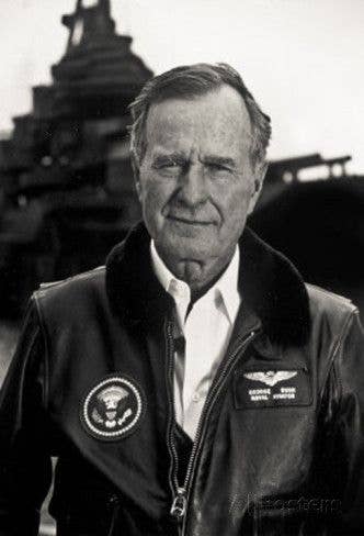 Bush 41 sporting his Naval Aviator's Wings of Gold on his flight jacket. (Photo: White House)