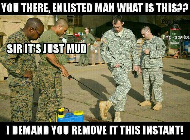 Notice that the Marine on the left is straight-up supervising a boot cleaning.