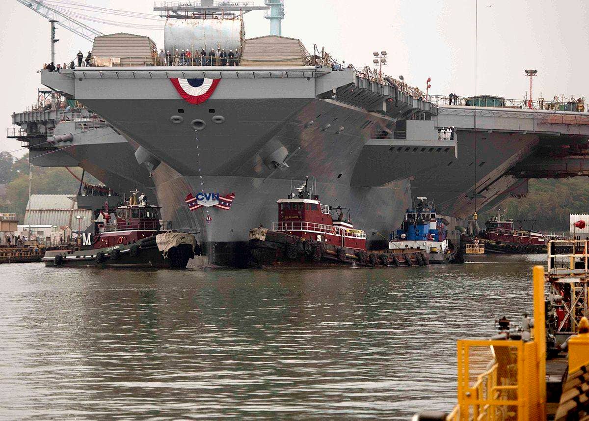 The Navy's Pre-Commissioning Unit Gerald R. Ford is moved from one shipyard to another in 2013. When launched, the Ford-class carriers will be the largest aircraft carriers in history. (Photo: U.S. Navy Mass Communication Specialist 2nd Class Aidan P. Campbell)