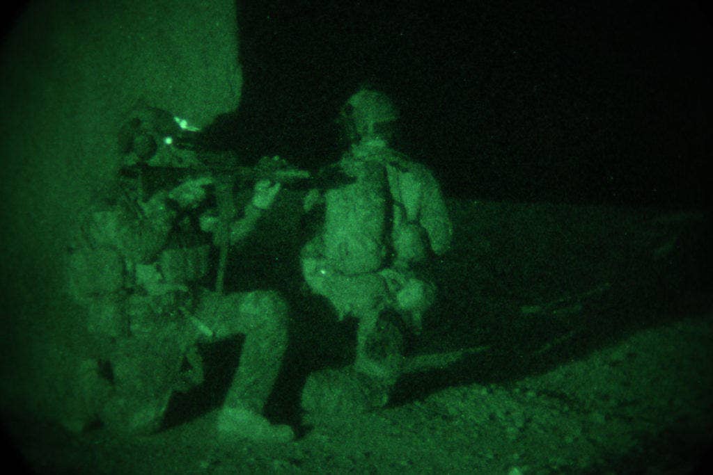 Afghan and coalition force members provide security during an operation in search of a Taliban leader in Kandahar city, Kandahar province, Afghanistan, April 21, 2013. (U.S. Army photo by Spc. Matthew Hulett)
