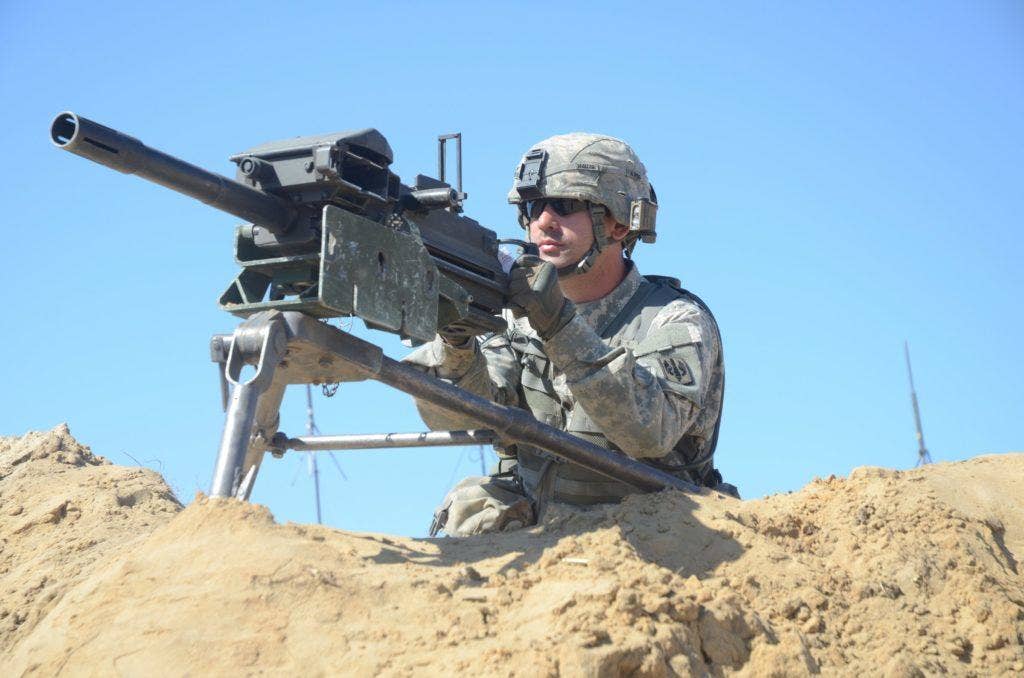 A US Army soldier with an MK-19 grenade launcher. | Photo by Sgt. Benjamin Parsons