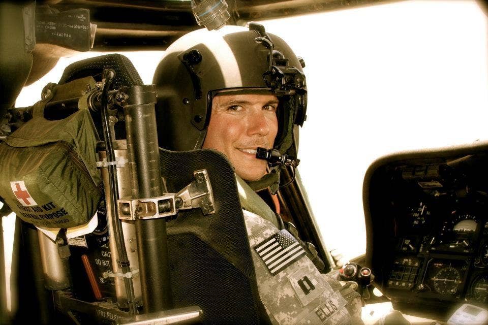Ellis behind the controls of a U.S. Army Blackhawk. (Photo courtesy of Nate Ellis)