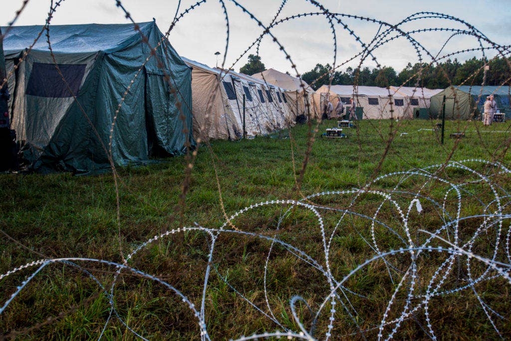 Multiple tents connect to create a Combat Operations Center during a 2nd Marine Division Command Post Exercise at Camp Lejeune, N.C., Oct. 29, 2015. (U.S. Marine Corps photo by Cpl. Kirstin Merrimarahajara/Released)
