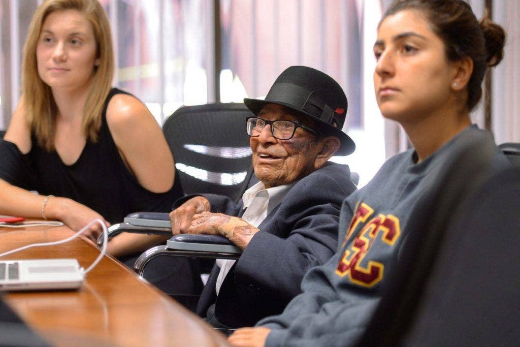 Alfonso Gonzales, a World War II vet, finishes up his last class in autographical writing at the USC Davis School of Gerontology. (USC Photo/Gus Ruelas)