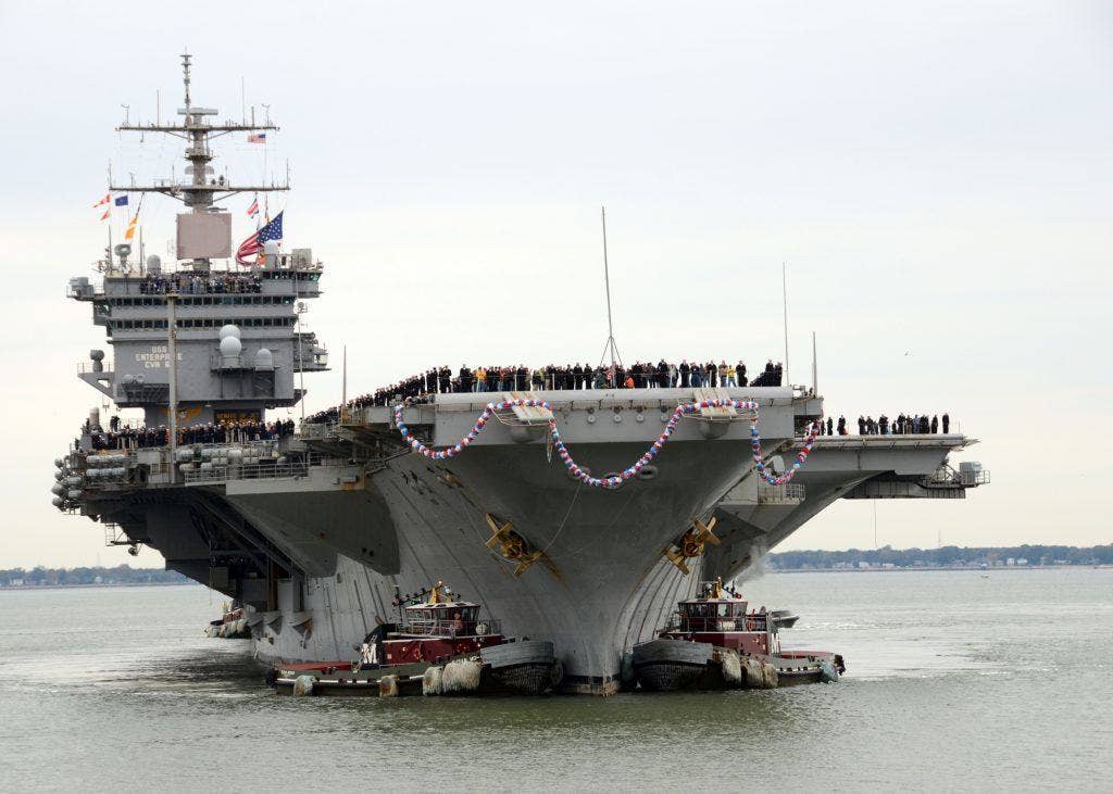 NORFOLK (Nov. 4, 2012) The aircraft carrier USS Enterprise (CVN 65) arrives at Naval Station Norfolk. Enterprise's return to Norfolk will be the 25th and final homecoming of her 51 years of distinguished service. (U.S. Navy photo by Mass Communication Specialist 1st Class Rafael Martie/Released)