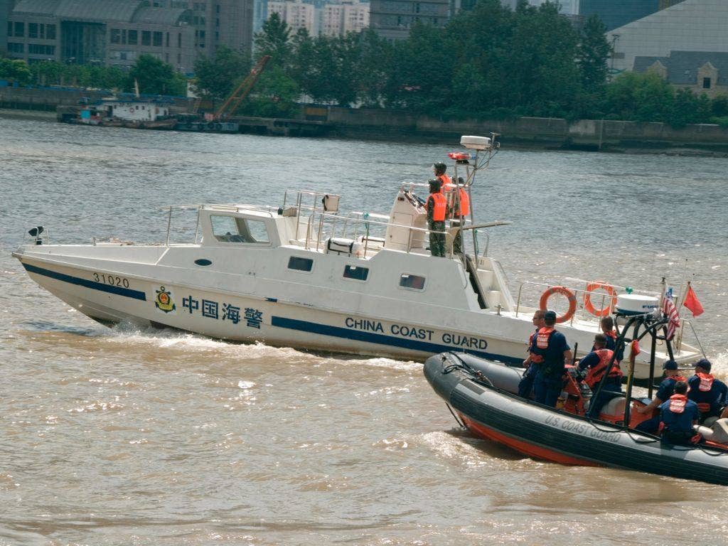 The crew from the U.S. Coast Guard Cutter Boutwell trains with the China coast guard. | US Coast Guard photo by Petty Officer Jonathan R. Cilley