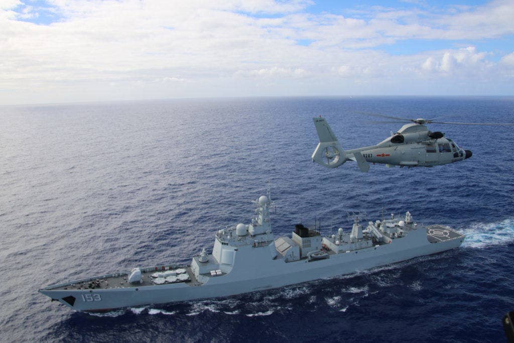 A helicopter attached to Chinese Navy ship multirole frigate Hengshui (572) participates in a maritime interdiction event with the Chinese Navy guided-missile destroyer Xi'an (153) during Rim of the Pacific. (Chinese navy photo by Sun Hongjie)