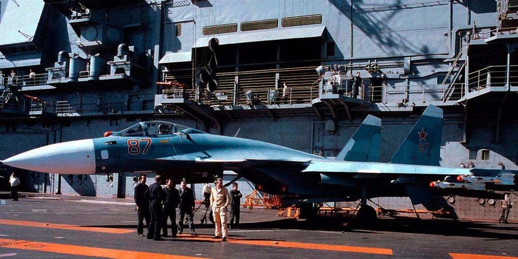 An Su-33 on the deck of the Admiral Kuznetsov. | Public Domain photo by Todd Summerlin