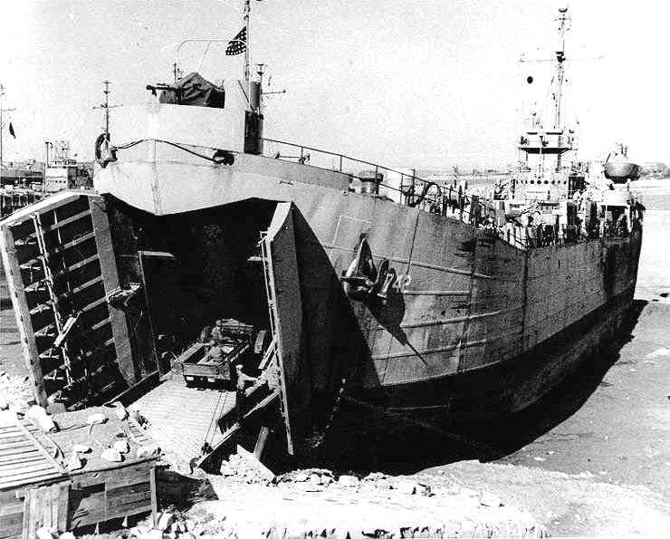 The LST-742 loads supplies in Korea in October 1950. The ship design was created in World War II to allow the ships to rapidly deploy tanks and other supplies on landing beaches. (Photo: National Archives)
