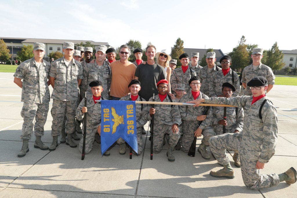 Kurt Russell, Pete Berg, and Kate Hudson with assembled airmen at Keesler Air Force Base. | Photo courtesy of Lionsgate