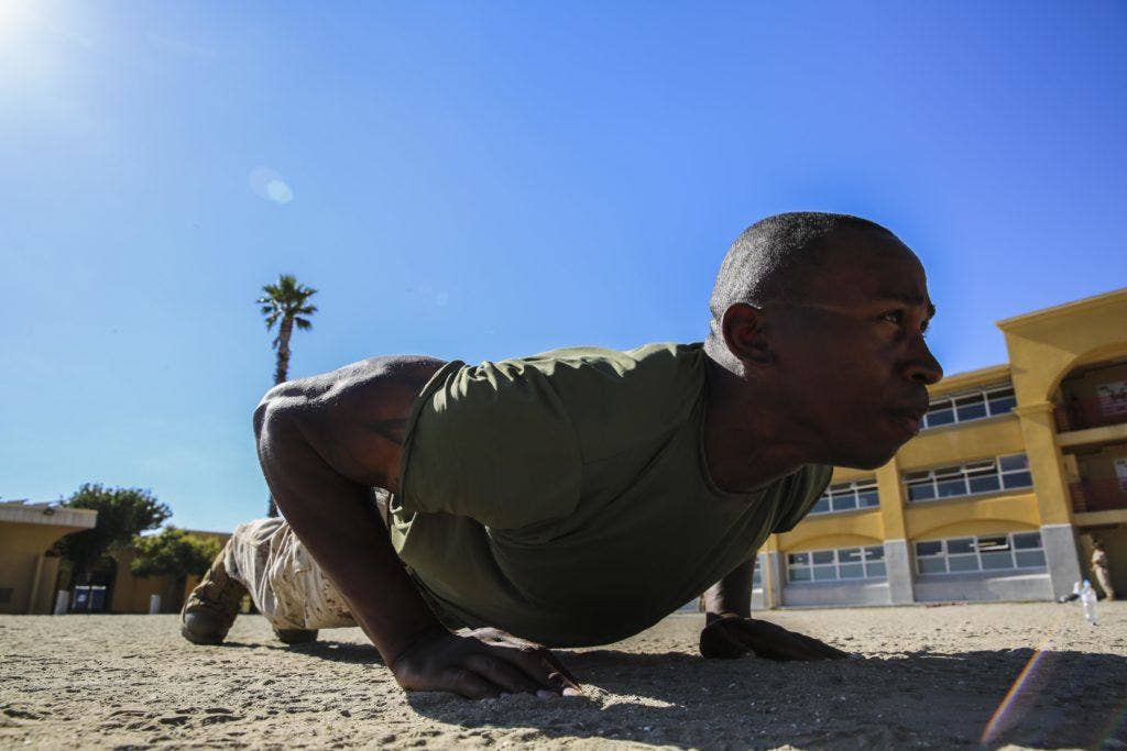 Private First Class Shawndel Hunter, Delta Company, 1st Recruit Training Battalion, does a pushup at Marine Corps Recruit Depot San Diego. | US Marine Corps photo by Sgt. Tyler Viglione