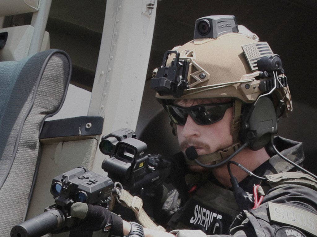 Developed exclusively for high-speed operations where low profile and bomber durability are a must, the Elite Ops Camera has a curved housing that fits to the contours of a trooper's helmet. The camera can endure a drop of six feet, is waterproof to 30 feet and has been jump tested. (Photo from MOHOC)