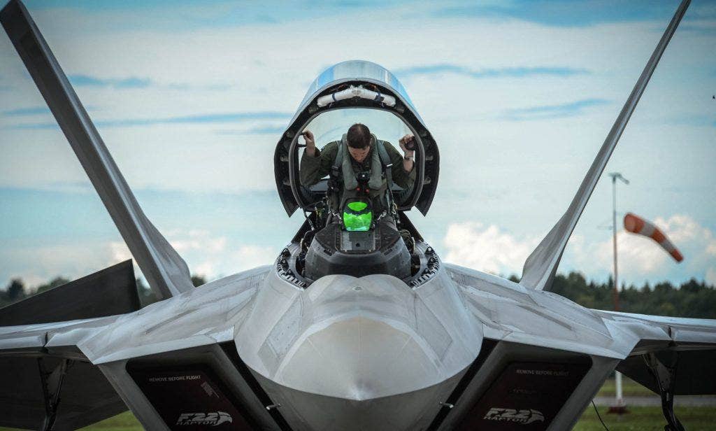 A pilot climbs into the cockpit of the F-35 | US Air Force photo