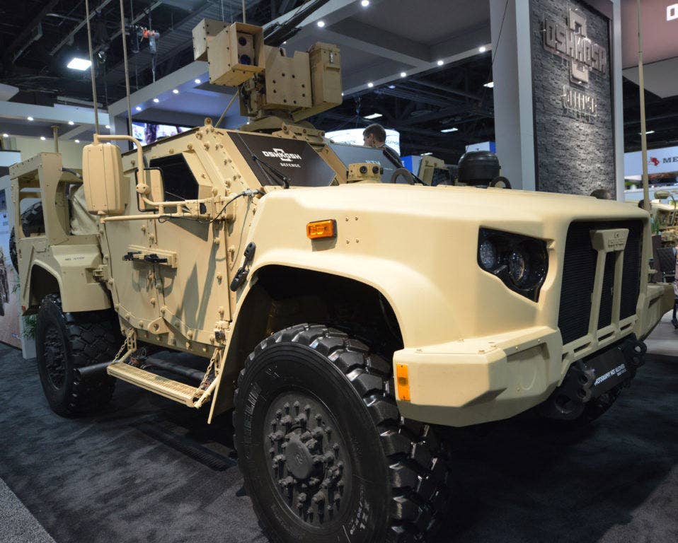 A Joint Light Tactical Vehicle production model is displayed by Oshkosh on the floor of the AUSA Annual Meeting and Exhibition in the Washington Convention Center Oct. 4, 2016. | US Army photo by Gary Sheftick