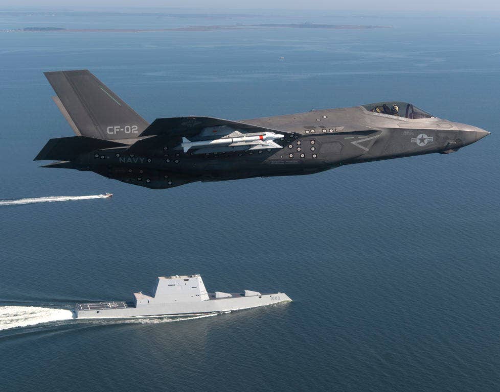 An F-35 Lightning II Carrier Variant (CV) flies over the stealth guided-missile destroyer USS Zumwalt (DDG 1000) as the ship transits the Chesapeake Bay on Oct. 17, 2016. Note that the F-35 is carrying missiles externally, rendering it more visible to radar. (U.S. Navy photo by Andy Wolfe/Released)