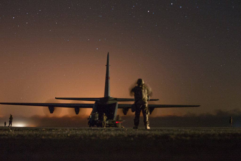 A U.S. Air Force C-130J Super Hercules waits to unload logistical supplies in support of the fight for Mosul at Qayyarah West Airfield, Iraq, Oct. 22, 2016. This is the second aircraft to land there following completion of repairs to the runway after Da'esh damaged it. (Photo and cutline: U.S. Army Spc. Christopher Brecht)