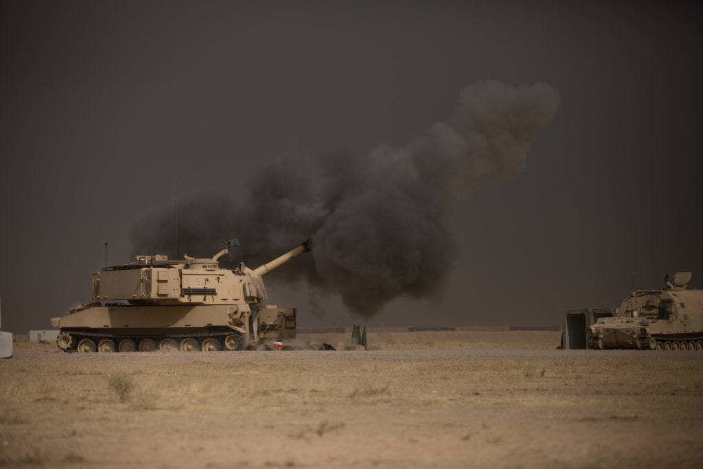 A U.S. Army M109A6 Paladin conducts a fire mission in support of Operation Inherent Resolve. (U.S. Army photo by Spc. Christopher Brecht)
