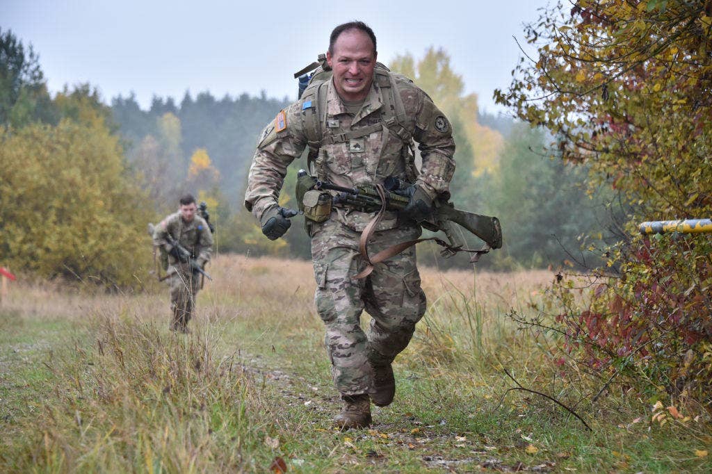 U.S. Soldiers with 2nd Cavalry Regiment master the Rough Terrain Run task during the European Best Sniper Squad Competition at the 7th Army Training Command's, Grafenwoehr Training Area, Bavaria, Germany, Oct. 26, 2016. (Photo and cutline: U.S. Army Visual Information Specialist Gertrud Zach)