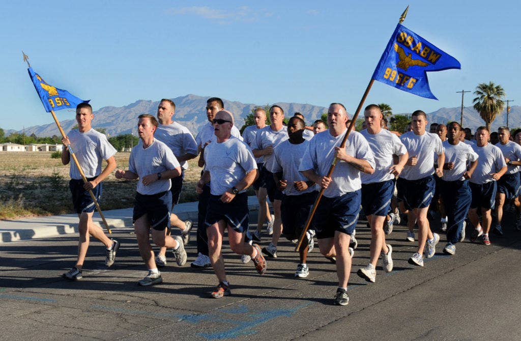 Members of the 99th Security Forces Group perform cadence while running in the formation (Photo by Air Force Senior Airman Stephanie Rubi)